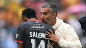 Saleng gets instructions from his coach during a Carling Black Label cup